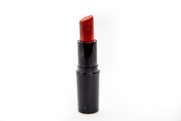 red lipstick for professional makeup on white background