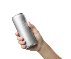 Woman holding aluminum can with beverage on white background, closeup. Space for design