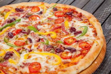  appetizing, fresh pizza on the table, for a design decoration in cooking
