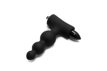 Black anal vibrator isolated on white background. View from above