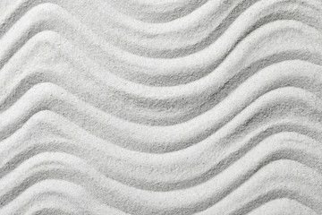 Obraz na płótnie Canvas Zen garden pattern on sand as background, top view. Meditation and harmony
