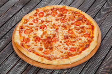  appetizing, fresh pizza on the table, for a design decoration in cooking