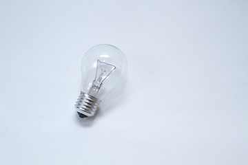 Light bulb on a gray background.