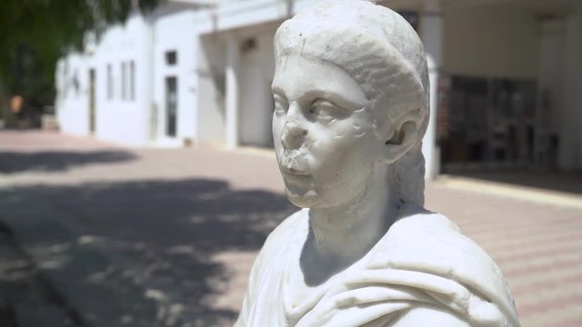Ancient Roman Empire marble bust at the city of Carthage, Tunisia, North Africa.