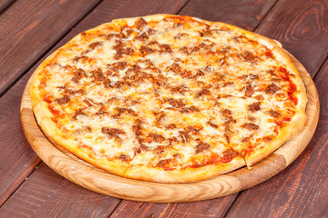  appetizing, fresh pizza on the table, for a design decoration in cooking