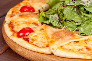  appetizing, fresh pizza on the table, for a design decoration in cooking