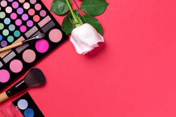 Obraz na płótnie Canvas Set of cosmetics on color background with flowers.