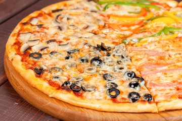  appetizing, fresh pizza on the table, for a design decoration in cooking