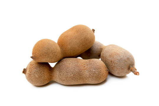 Ripe sweet tamarind isolated on white background