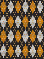 Argyle print. Seamless knitted pattern with rhombuses. Checkered background in orange, black and white colors. It can be used as a Halloween background. Vector illustration