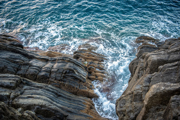 Riomaggiore Shore Closeup of Rocks and Sea