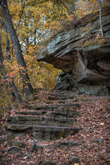 Stone Stairway and Rock Formation in Forest in Autumn