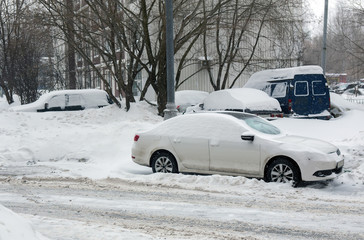 cars in the Parking lot in the winter © Yuri Bizgaimer