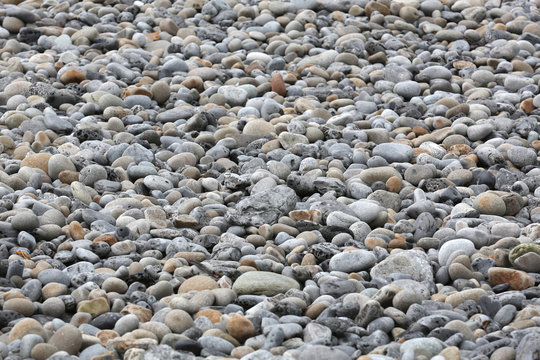 A lot of round stones at the beach