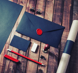 Retro stationery set on wooden background. Responsive design mockup. Flat lay.