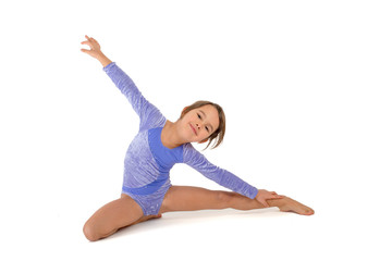 Little gymnast on a white background. Sporting exercise, stretch, flexibility, aerobics