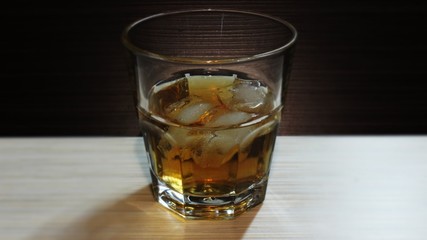 whiskey with ice in a glass