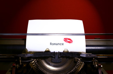 Red lipstick print on paper.