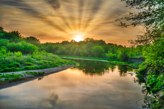 Fototapeta Sunset over river