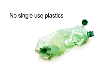 Used plastic bottles crushed and crumpled against isolated on the white background. Recycling concept
