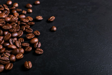Fragrant coffee beans on rustic tabletop background. Banner copy space.