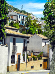 Fototapeta na wymiar Granada, Albaicin. White houses, summertime in Spain.