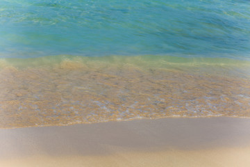 Fototapeta na wymiar Beach - water and sand background.