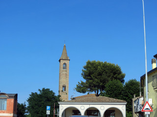 The bell tower of the Church in a small  town in the province of Emilia Romagna, Italy, Europe.