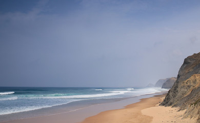Praia da Bordeira in Carrapateira, Algarve, Portugal. Empty beach early in the morning before all the surfers and tourists arrive. 
