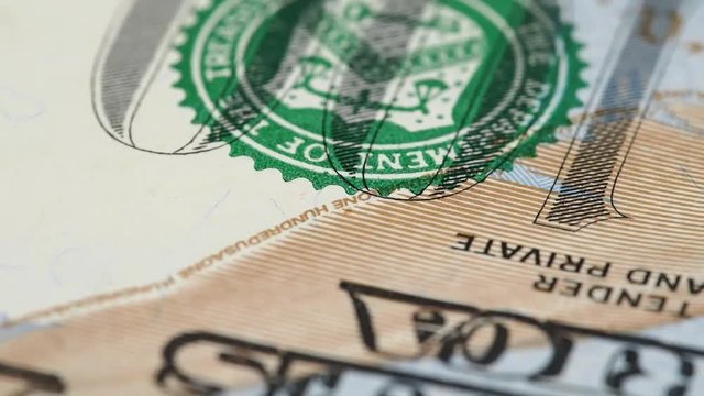 US 100 dollar bill macro slow rotating. United States money. Low angle. Stock video footage