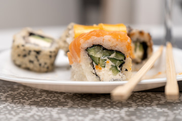 Close-up. Rolls with salmon and cottage cheese