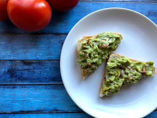 Guacamole Toast slices.  Healthy lifestyle concept.