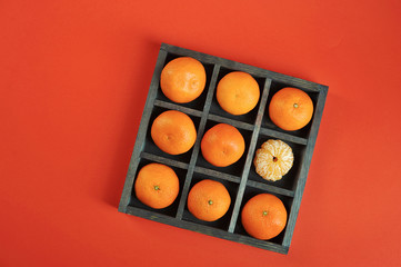 tangerines with in wooden box