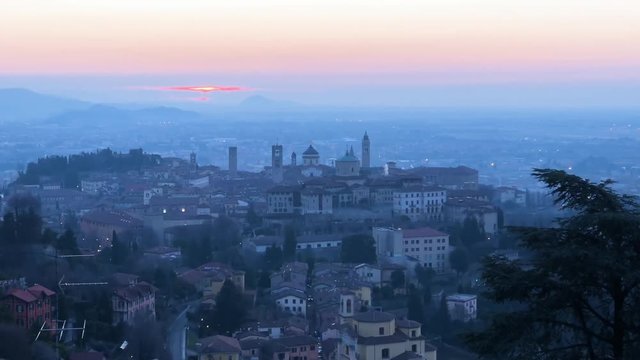 Amazing panoramatic sunrise view of Bergamo, one of the most beautiful city in Italy, Lombardy, 4k footage video.