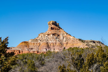 Fototapeta na wymiar Rock formations and natural geologic layering at Palo Duro Canyon State Park near Amarillo, Texas