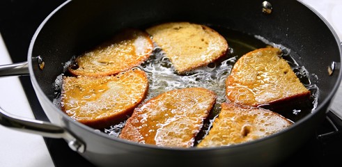 Frying bread in hot oil