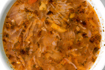 Ukrainian national dish, borsch in a white plate