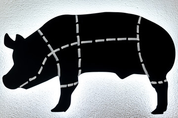 Black and white pig cutting