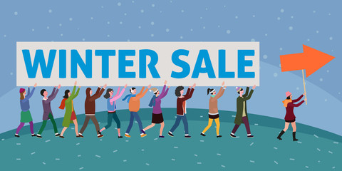 large group of people bringing winter sale sign forward