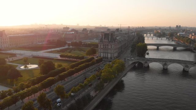 Aerial view to Tuileries Gardens, Louvre and Seine&not;&yen;s river at sunrise, Paris, France