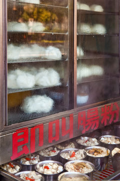 Food stall, steamed pork buns, in Kowloon, Hong Kong, China