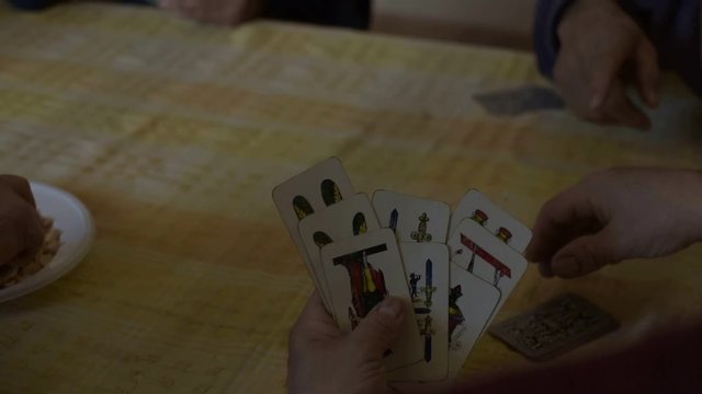 Playing with Italian card deck in south of Italy.