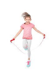 Full length portrait of girl jumping rope on white background