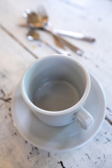 cup of coffee on wooden table
