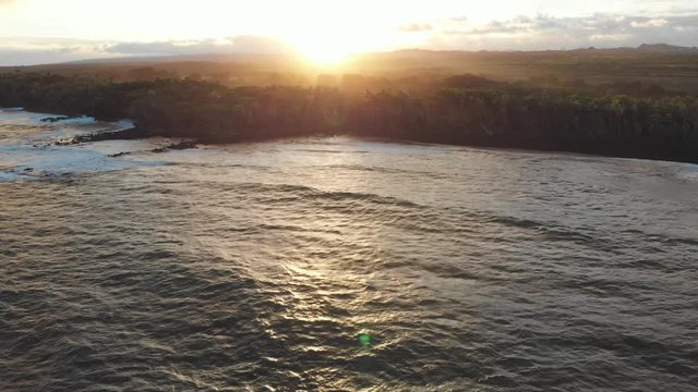 sunset at Pohoiki (Isaac Hale park) new black sand, shot pulls backward