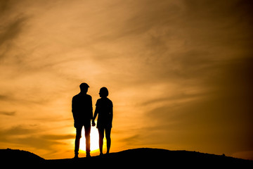 Silhouette couple at sunset