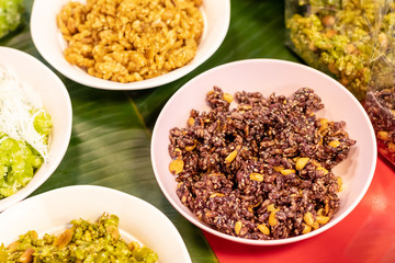 Khao Mao stirred in a bowl.