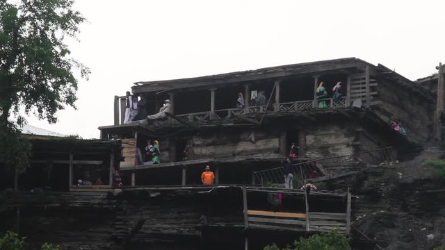 Time lapse showing movement of Kalash people in a mountain village of Pakistan