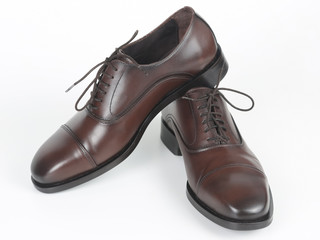 Classic men's brown Leather shoes on white background