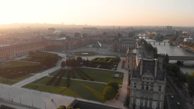 Aerial view to Tuileries Gardens, Louvre and Seine&not;&yen;s river at sunrise, Paris, France
